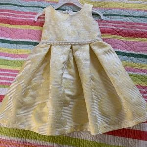 Beautiful yellow and ivory dress. Worn once. Perfect condition.